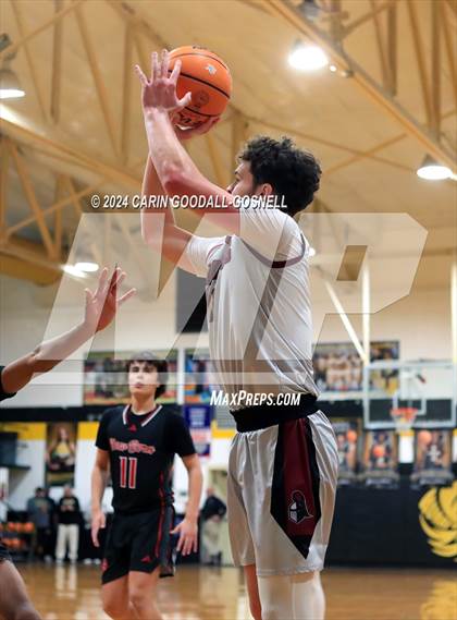 Thumbnail 3 in Living Water Christian vs. New Bern (Hurricane Holiday Classic) photogallery.