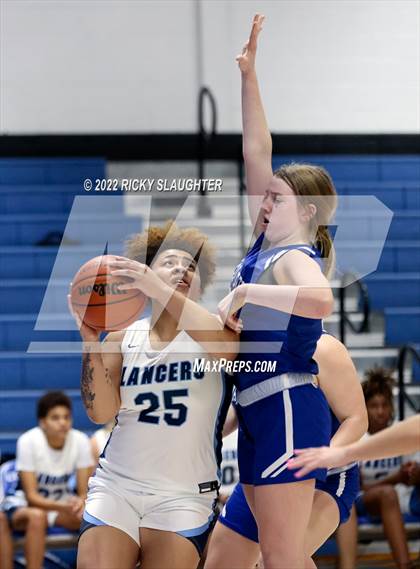 Thumbnail 2 in Belleville East vs. Marquette Catholic (12th Annual Columbia Girls Basketball Tip Off Classic) photogallery.