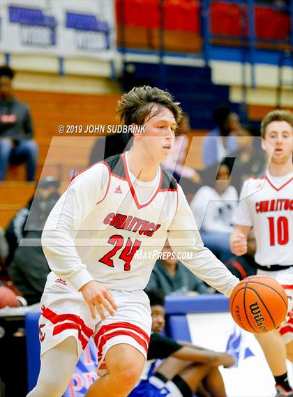 Thumbnail 2 in Currituck County vs Woodrow Wilson (Robert L. Vaughan Border Clash Basketball Invitational) photogallery.