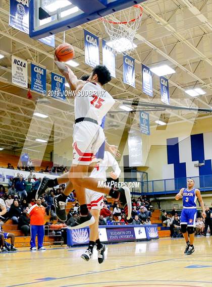 Thumbnail 3 in Currituck County vs Woodrow Wilson (Robert L. Vaughan Border Clash Basketball Invitational) photogallery.