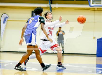 Thumbnail 3 in Currituck County vs Woodrow Wilson (Robert L. Vaughan Border Clash Basketball Invitational) photogallery.