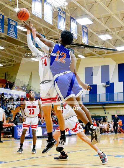 Thumbnail 1 in Currituck County vs Woodrow Wilson (Robert L. Vaughan Border Clash Basketball Invitational) photogallery.