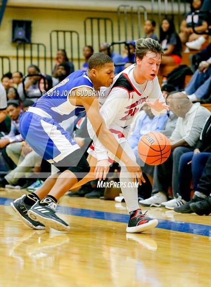 Thumbnail 2 in Currituck County vs Woodrow Wilson (Robert L. Vaughan Border Clash Basketball Invitational) photogallery.