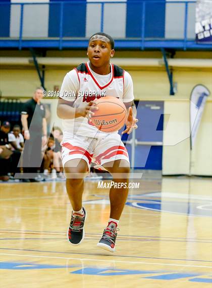 Thumbnail 2 in Currituck County vs Woodrow Wilson (Robert L. Vaughan Border Clash Basketball Invitational) photogallery.