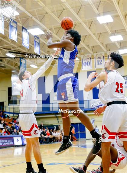 Thumbnail 3 in Currituck County vs Woodrow Wilson (Robert L. Vaughan Border Clash Basketball Invitational) photogallery.