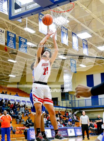 Thumbnail 3 in Currituck County vs Woodrow Wilson (Robert L. Vaughan Border Clash Basketball Invitational) photogallery.