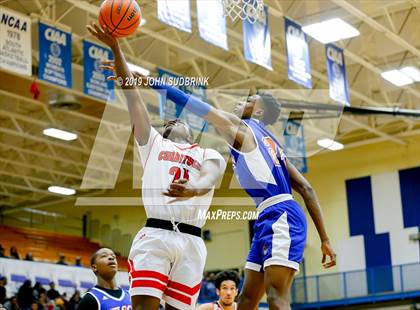 Thumbnail 2 in Currituck County vs Woodrow Wilson (Robert L. Vaughan Border Clash Basketball Invitational) photogallery.