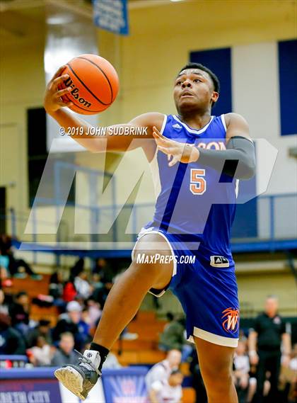 Thumbnail 1 in Currituck County vs Woodrow Wilson (Robert L. Vaughan Border Clash Basketball Invitational) photogallery.
