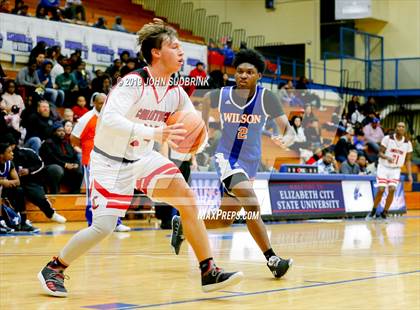 Thumbnail 3 in Currituck County vs Woodrow Wilson (Robert L. Vaughan Border Clash Basketball Invitational) photogallery.