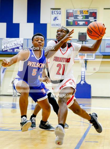 Thumbnail 2 in Currituck County vs Woodrow Wilson (Robert L. Vaughan Border Clash Basketball Invitational) photogallery.