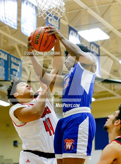 Thumbnail 2 in Currituck County vs Woodrow Wilson (Robert L. Vaughan Border Clash Basketball Invitational) photogallery.