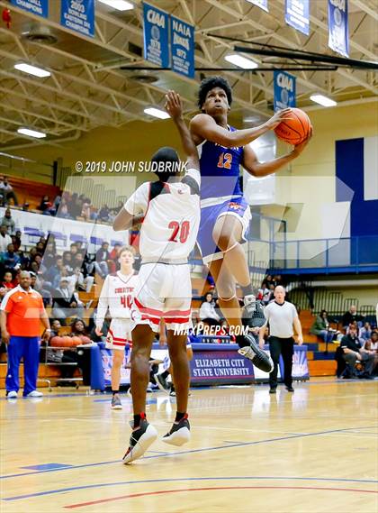 Thumbnail 1 in Currituck County vs Woodrow Wilson (Robert L. Vaughan Border Clash Basketball Invitational) photogallery.