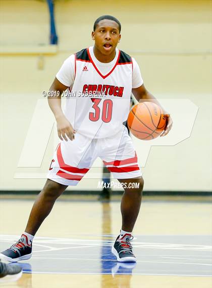 Thumbnail 1 in Currituck County vs Woodrow Wilson (Robert L. Vaughan Border Clash Basketball Invitational) photogallery.