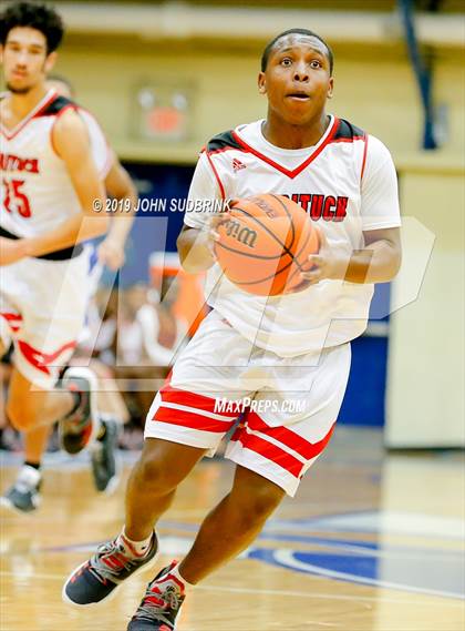Thumbnail 2 in Currituck County vs Woodrow Wilson (Robert L. Vaughan Border Clash Basketball Invitational) photogallery.
