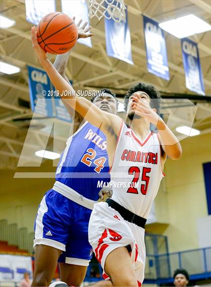 Thumbnail 3 in Currituck County vs Woodrow Wilson (Robert L. Vaughan Border Clash Basketball Invitational) photogallery.