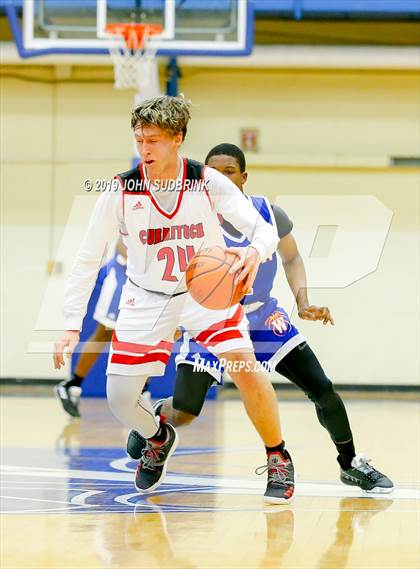 Thumbnail 3 in Currituck County vs Woodrow Wilson (Robert L. Vaughan Border Clash Basketball Invitational) photogallery.