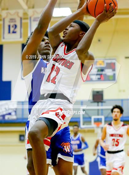 Thumbnail 1 in Currituck County vs Woodrow Wilson (Robert L. Vaughan Border Clash Basketball Invitational) photogallery.