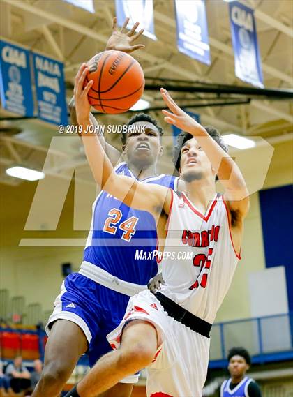 Thumbnail 2 in Currituck County vs Woodrow Wilson (Robert L. Vaughan Border Clash Basketball Invitational) photogallery.