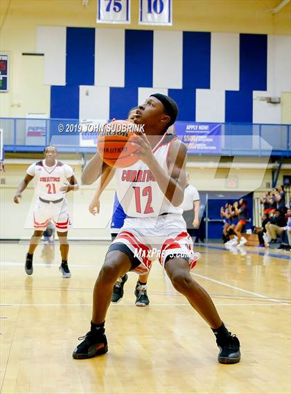 Thumbnail 1 in Currituck County vs Woodrow Wilson (Robert L. Vaughan Border Clash Basketball Invitational) photogallery.