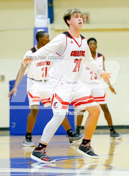 Thumbnail 3 in Currituck County vs Woodrow Wilson (Robert L. Vaughan Border Clash Basketball Invitational) photogallery.