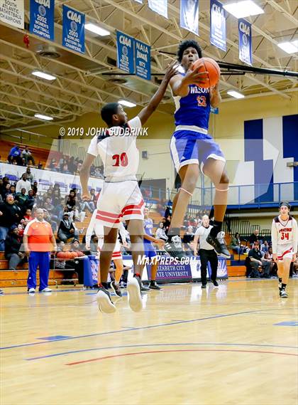 Thumbnail 3 in Currituck County vs Woodrow Wilson (Robert L. Vaughan Border Clash Basketball Invitational) photogallery.