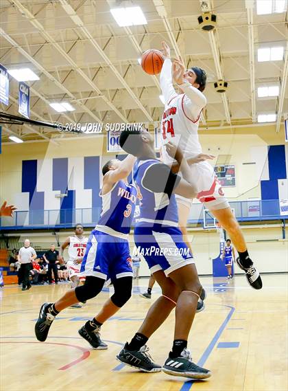 Thumbnail 2 in Currituck County vs Woodrow Wilson (Robert L. Vaughan Border Clash Basketball Invitational) photogallery.