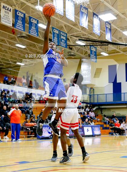Thumbnail 1 in Currituck County vs Woodrow Wilson (Robert L. Vaughan Border Clash Basketball Invitational) photogallery.