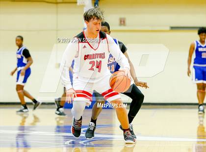 Thumbnail 2 in Currituck County vs Woodrow Wilson (Robert L. Vaughan Border Clash Basketball Invitational) photogallery.