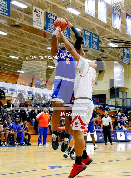 Thumbnail 1 in Currituck County vs Woodrow Wilson (Robert L. Vaughan Border Clash Basketball Invitational) photogallery.