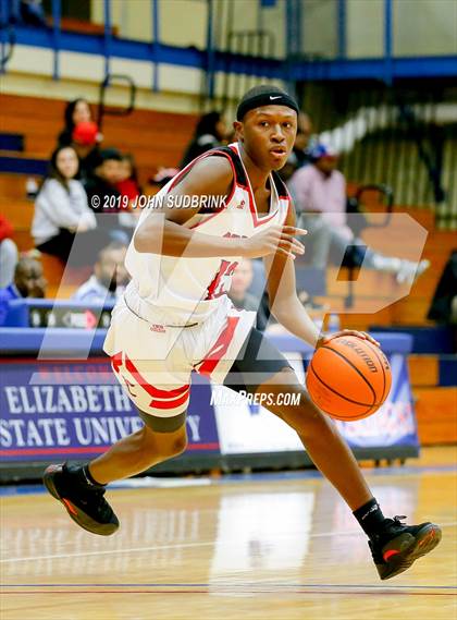 Thumbnail 3 in Currituck County vs Woodrow Wilson (Robert L. Vaughan Border Clash Basketball Invitational) photogallery.