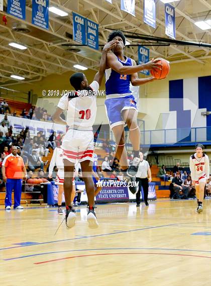 Thumbnail 2 in Currituck County vs Woodrow Wilson (Robert L. Vaughan Border Clash Basketball Invitational) photogallery.