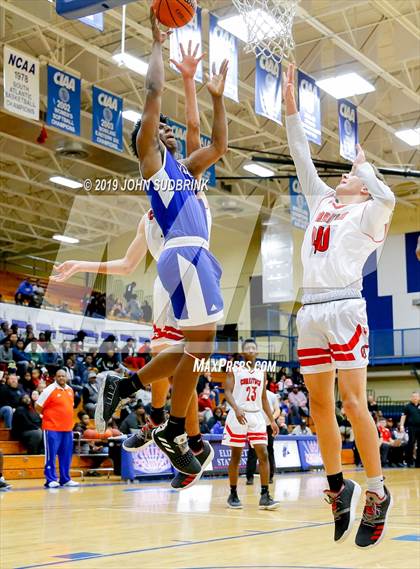 Thumbnail 1 in Currituck County vs Woodrow Wilson (Robert L. Vaughan Border Clash Basketball Invitational) photogallery.