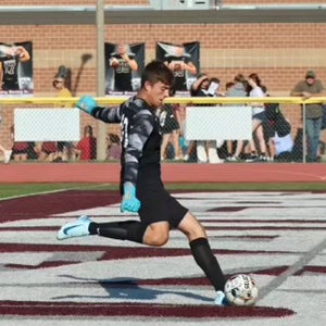 ETHAN MILLER