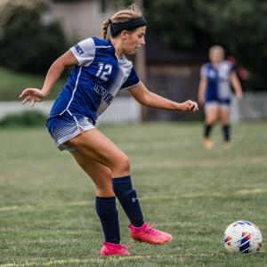 ZOE KUNKLE