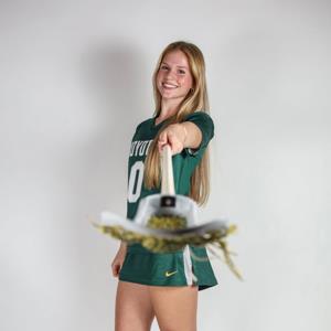 IZZY COKER