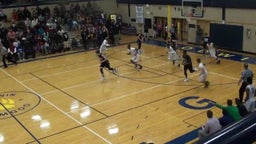 Godwin Heights basketball highlights vs. Grand Rapids