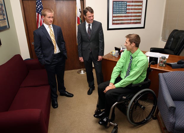 Michael Wilson, Senator Ted Gaines and Zach Pickett (left to right) wait in Gaines' office minutes before each went to the Senate floor Thursday at the state Capitol. 