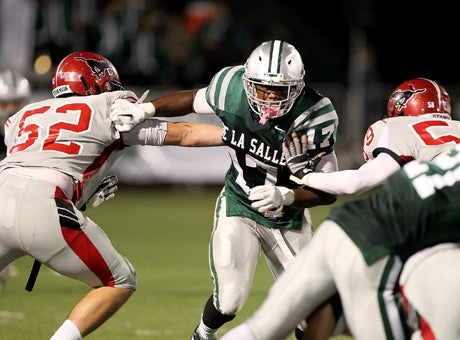 USC-bound linebacker Michael Hutchings (17) led a De La Salle defense that allowed on 159 total yards and no touchdowns in a 41-9 win over high-powered Monte Vista.