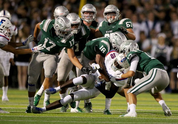 Isaiah Foskey (18), Richard Fahiua (17) and company somehow corral Joe Ngata. 