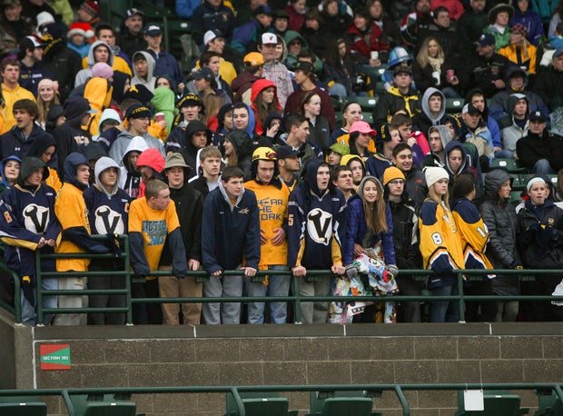 The Victor crowd watches from its mezzanine location.