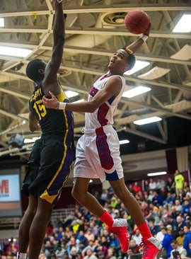 This dunk by Joshua Stamps swung momentum Curie's way in a big win over Montverde Academy at the Spalding Hoophall Classic.