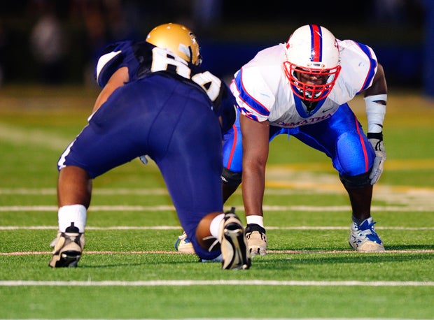 Cyrus Kouandjio is one of seven DeMatha alums drafted in the past 21 seasons.