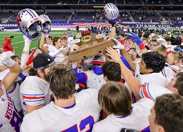 Westlake players celebrate their 6A Division 1 title win Saturday over Southlake Carroll.