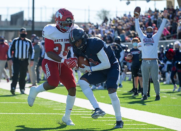 Marquis Shoulders hauls in an 18-yard touchdown pass for Tompkins in the second quarter.