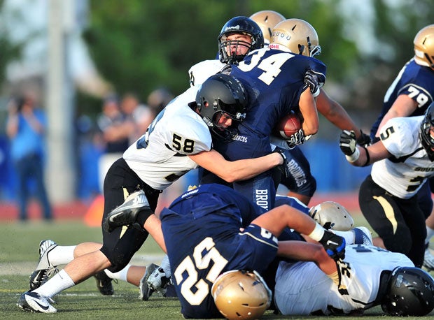South High (wearing white) took a trip to California and battled Vista Murrieta, one of the nation's top teams. That could pay dividends in this week's state-title game.