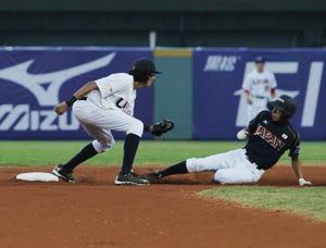 Cole Tucker makes the tag at second base.