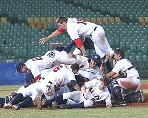 Cole Tucker celebrates with his teammates.