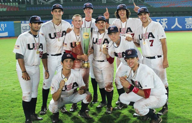Mountain Pointe's Cole Tucker (back row, right) raises his fingers in celebration after helping lead the USA 18U baseball team to a gold medal in Taiwan.