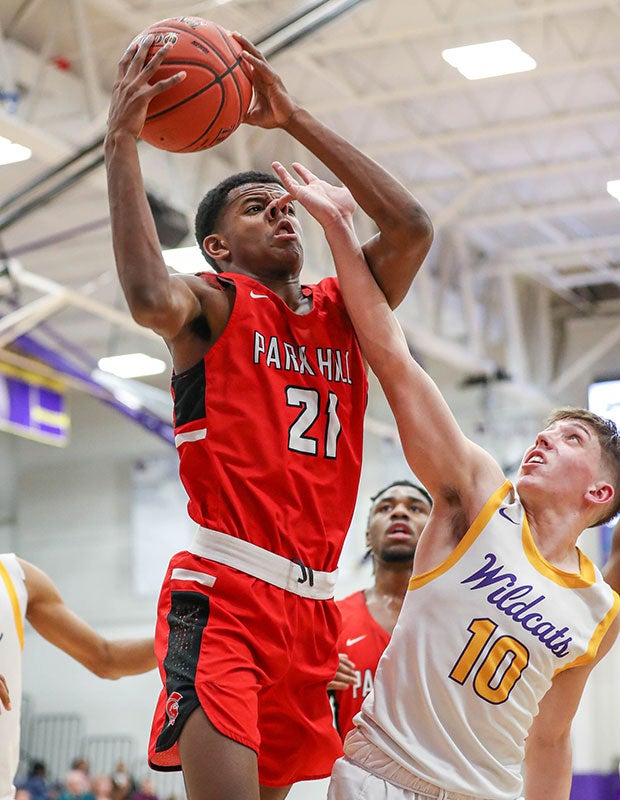 Park Hill (Mo.) guard Christian Bradford receives an inadvertent nose poke from Cooper Willich of Blue Springs.