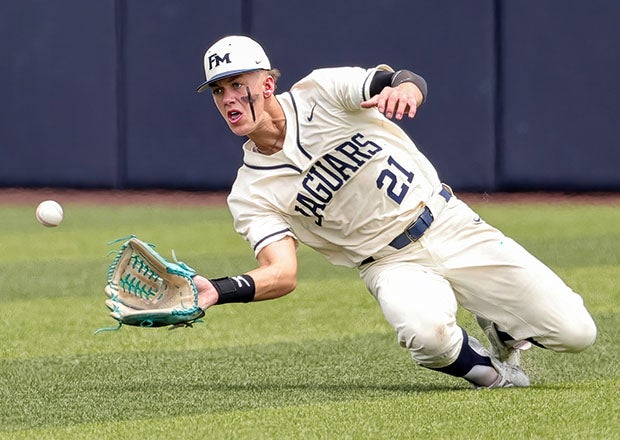 Sam Erickson of Flower Mound slides for a catch in the outfield during the Jaguars' win over Weatherford in the second game of the Class 6A semifinals in Texas. (Photo: Robbie Rakestraw)